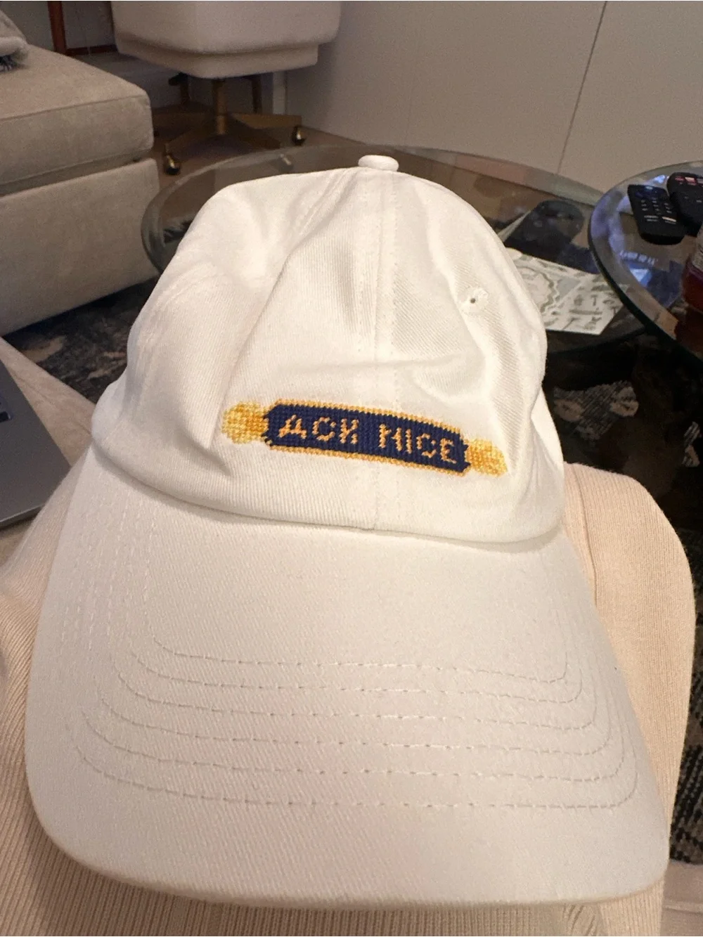 ACK White Baseball Cap with Blue & Yellow Embroidered Patch